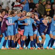 England players celebrate Alessia Russo's late goal against Australia