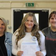 Natalie Wocior (centre) pictured with her mum and sister on results day