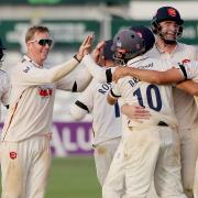 Simon Harmer celebrates with Essex teammates after beating Middlesex