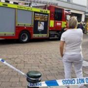 A cordon remains in place outside a Primark store in Romford's South Street