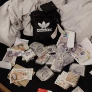 Cash recovered by police at the scene