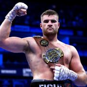 Johnny Fisher celebrates victory in the vacant Southern Area Heavyweight Title bout against Harry Armstrong at the O2 Arena last August  Image: PA