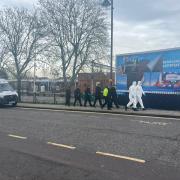 Police at Harold Wood station in February after a pensioner was killed