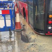 A bus sank into a hole on Front Lane, Upminster