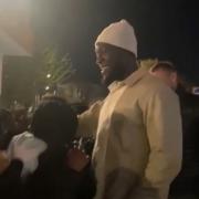 Stormzy was seen shaking hands with kids and greeting them