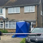 Police are at a house in Cornwall Close after a woman was killed by her dogs