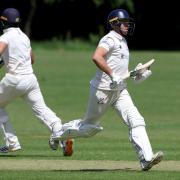 Upminster's Aaron Beard in action against Harold Wood