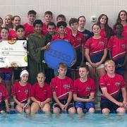Killerwhales Swim Club  celebrate receiving a Tesco Stronger Grant
