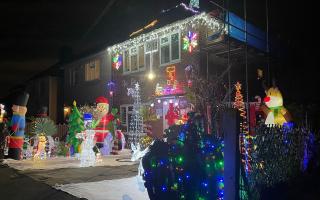 The Merritt home lit up with festive decorations in Prestwood Drive.