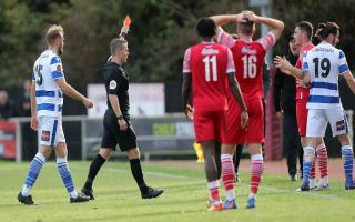 A red card is shown to Tom Wraight of Hornchurch (far right) in their FA Cup tie against Oxford City