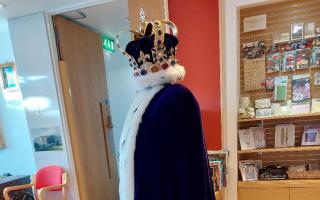 King Charles coronation cape in Havering Museum's foyer. Image credit: Havering Museum