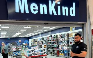 Store manager Jaffa Khan at Mercury Shopping Centre's re-opened MenKind
