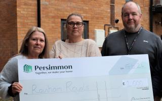 Rainham Royals' Paula Young and Sam Sheena with Cllr Matt Stanton receiving the cheque
