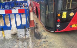 A bus sank into a hole in Front Lane, Upminster