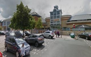 The men allegedly tried car door handles at the car park of the new M&S store in Lakeside shopping centre